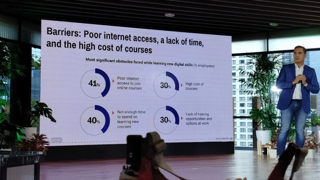 Google Philippines’ public policy and government relations head Yves Gonzales presents the top four barriers to learning new digital skill courses for Filipino employees on Wednesday, September 27, 2023 at the Menarco building in Bonifacio Global City.